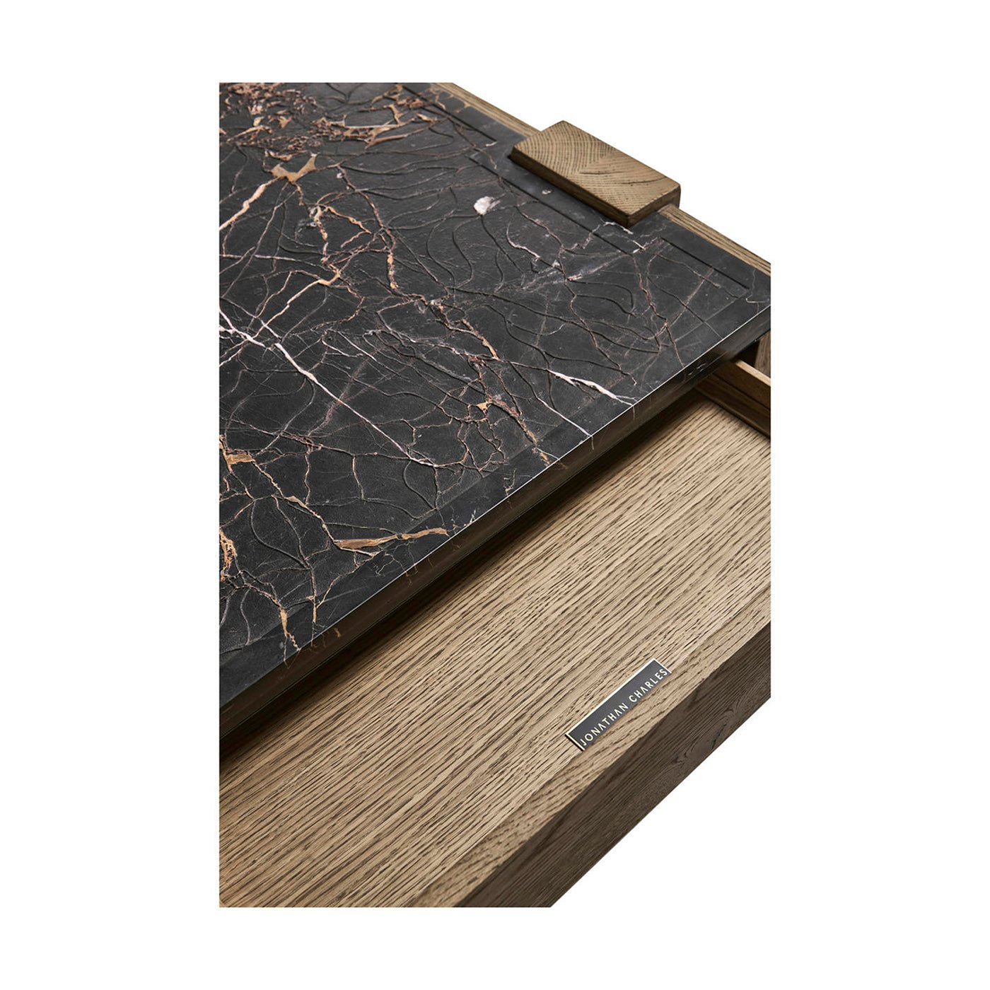 Close-up of marble top and oak coffee table.