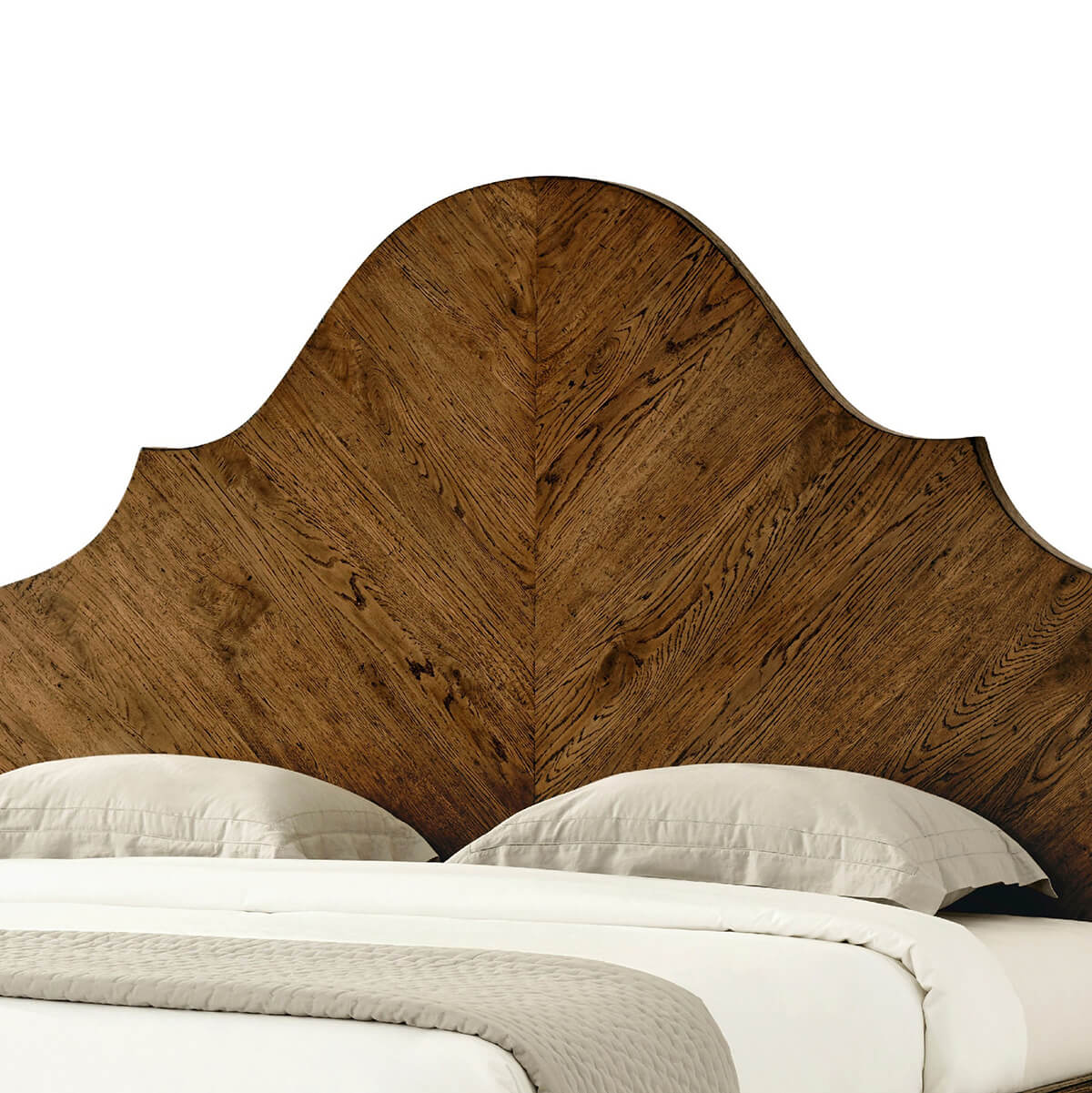 Close-up of rustic oak headboard detail and pillows.