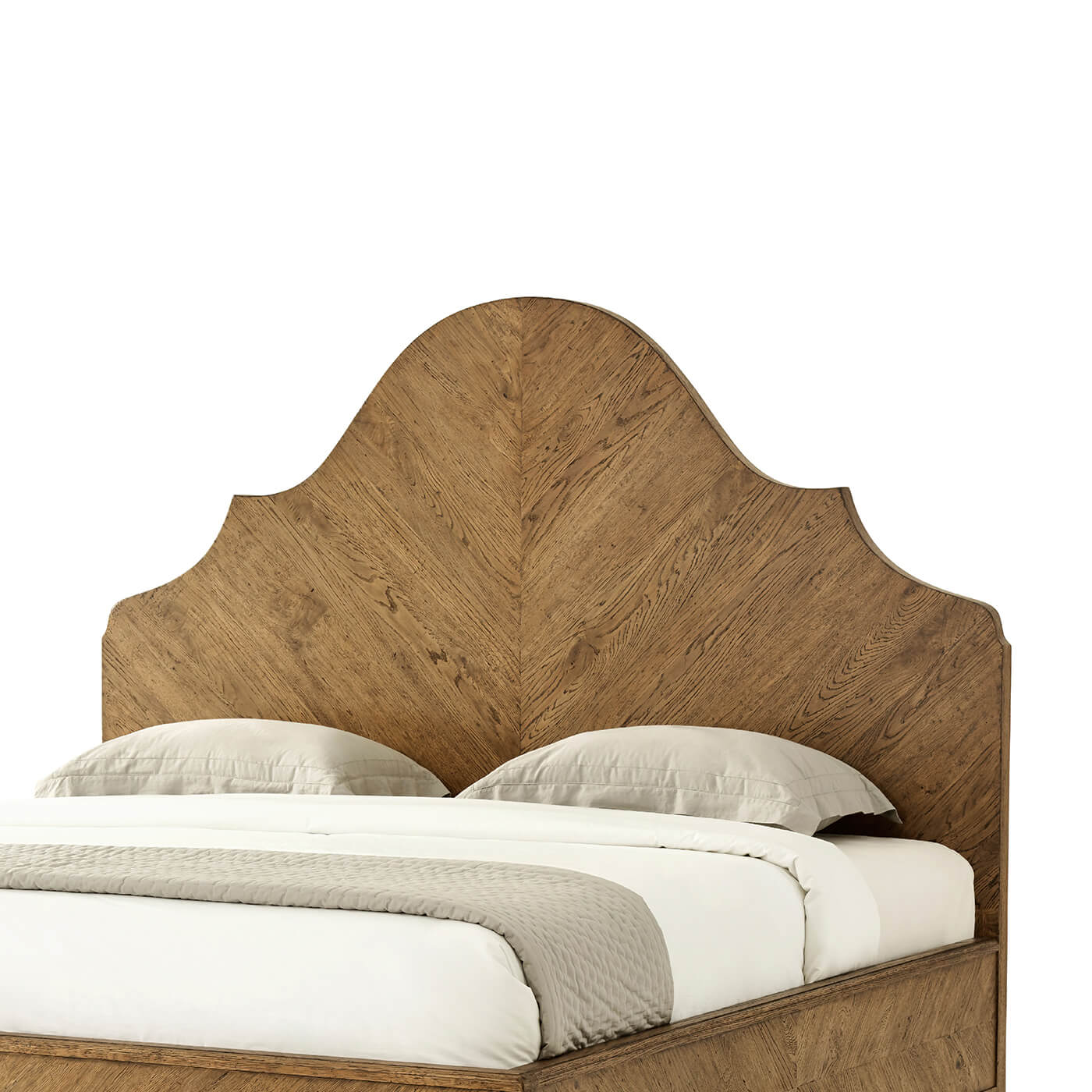 Close-up of oak headboard on queen bed.