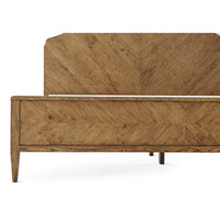 Front view of oak queen bed's footboard design.