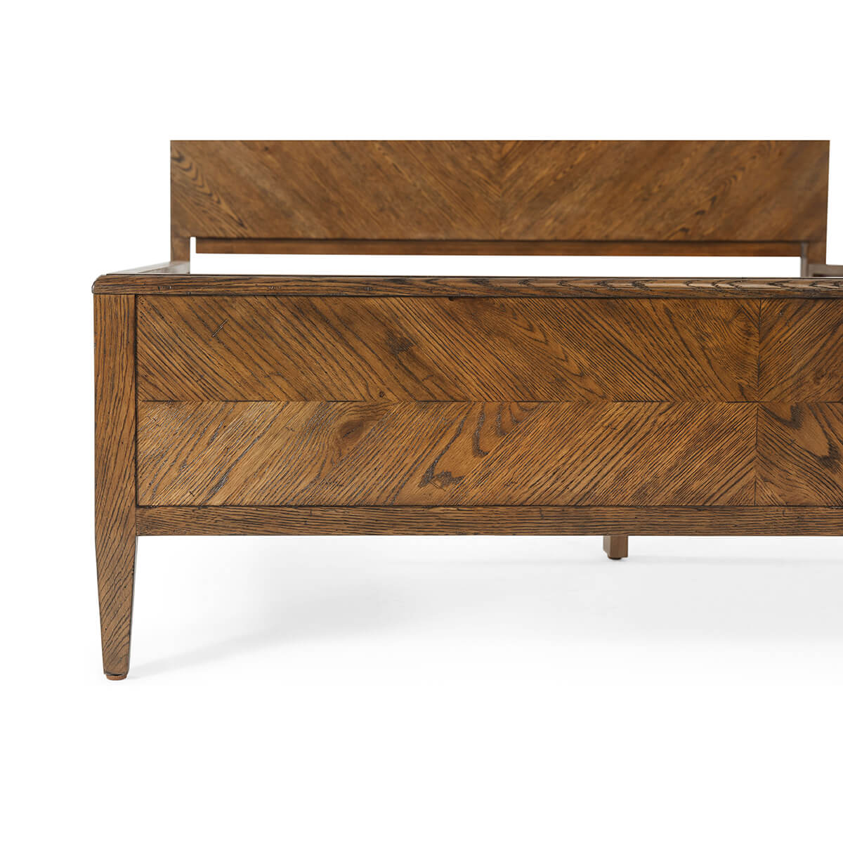 Modern rustic oak queen bed, footboard detail close-up.