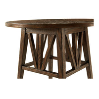Detail view of oak table legs and frame.