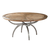 Modern rustic round dining table with metal legs, front view.