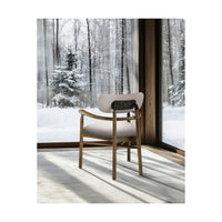 Modern rustic armchair in winter setting, stylish wooden frame