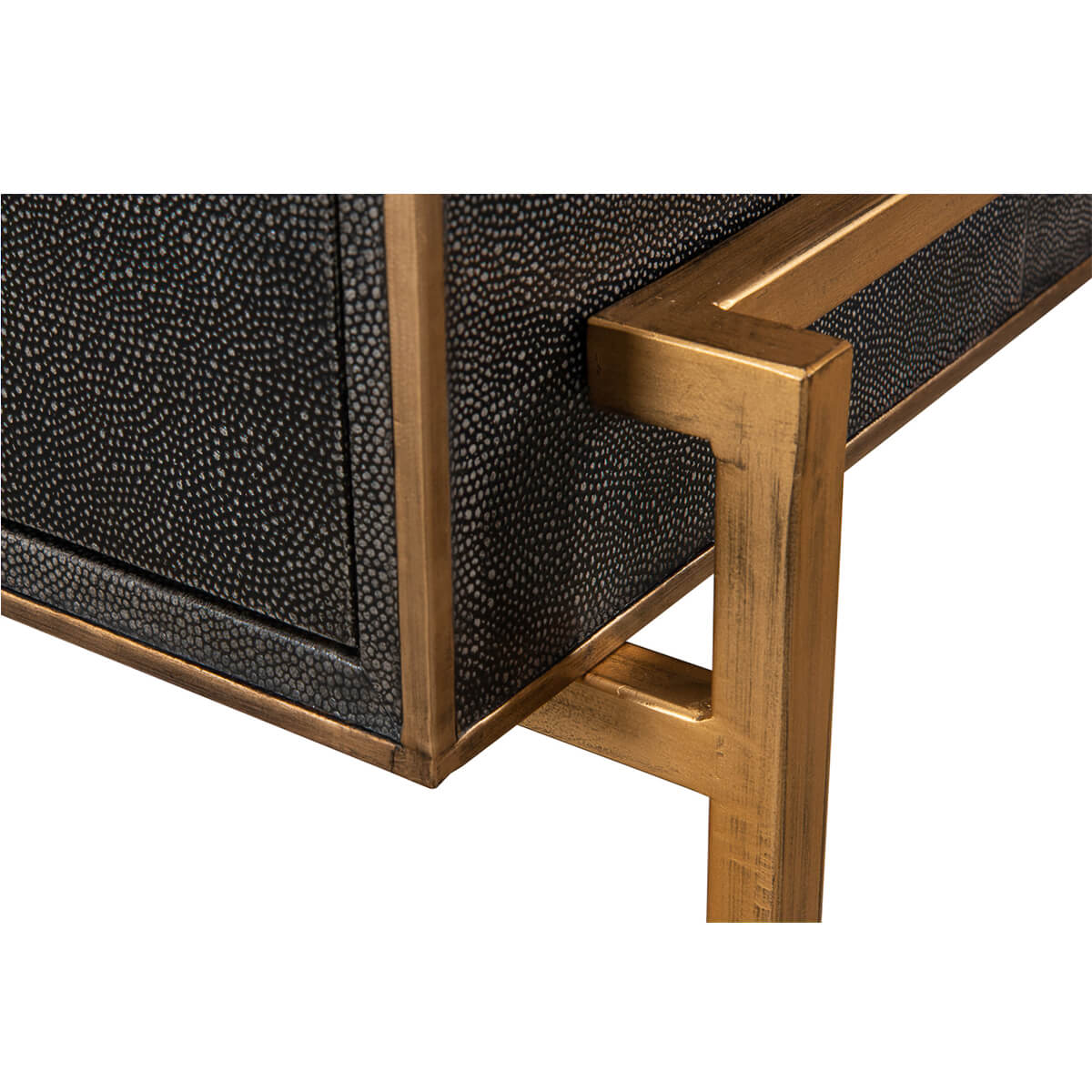 Frame corner detail on modern leather desk.