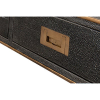 Another close-up of handle on leather desk drawer.