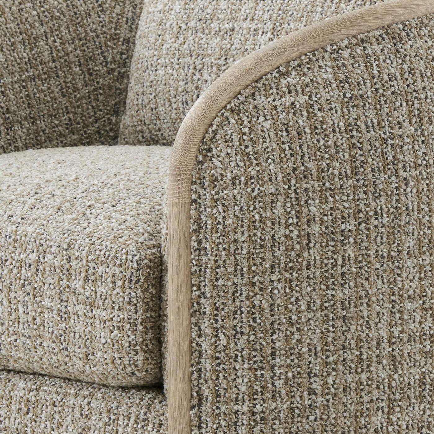 Close-up detail of modern swivel chair fabric texture.