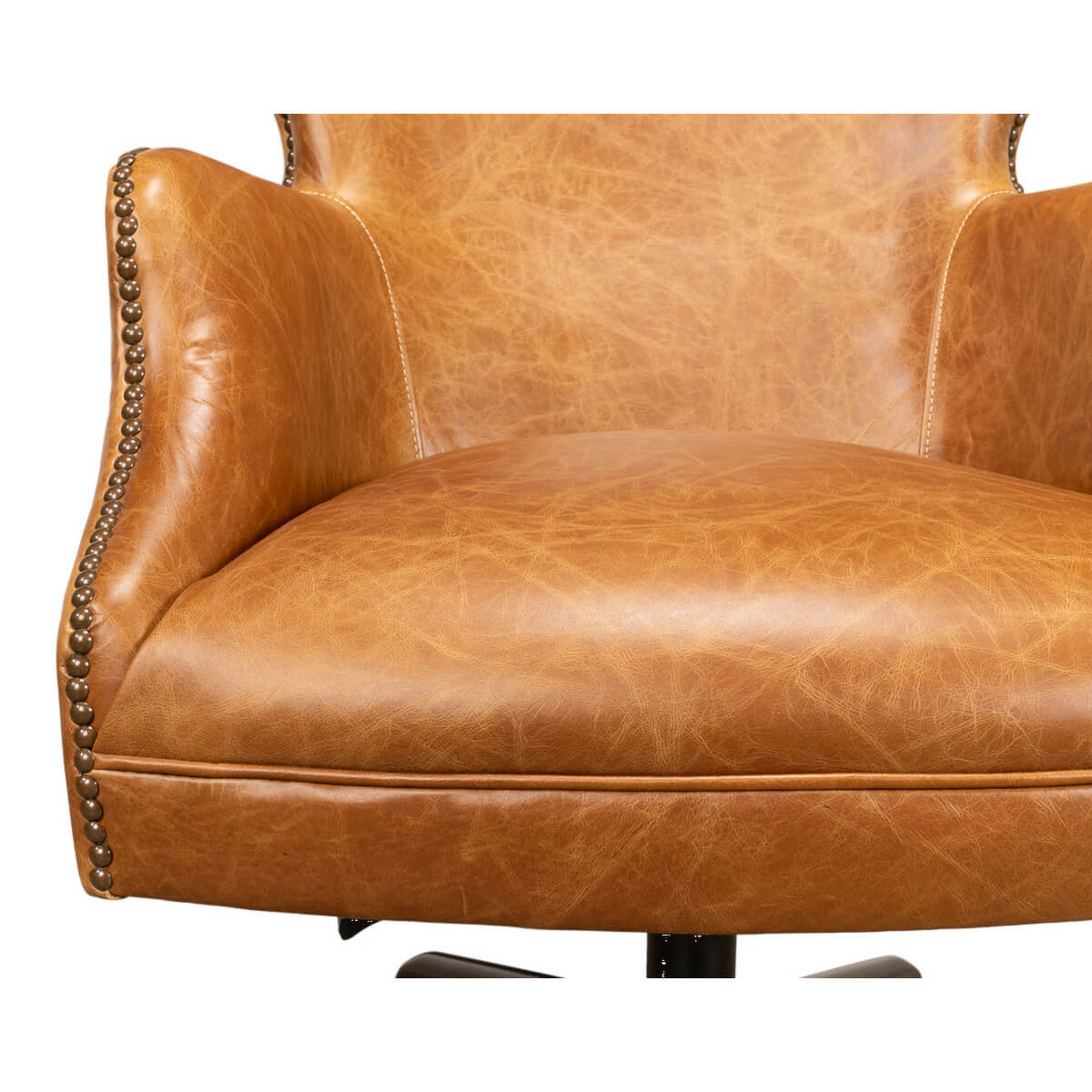 Brown leather desk chair, seat close-up.