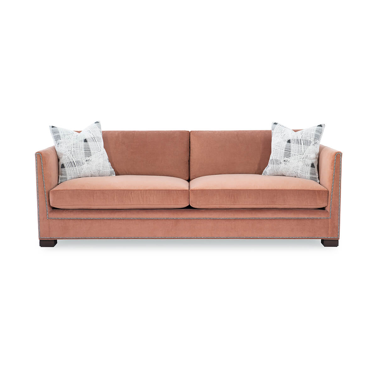 Front view of Thorpe sofa with patterned pillows.