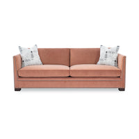 Front view of Thorpe sofa with patterned pillows.
