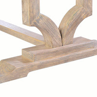 Detailed close-up of trestle table base design.