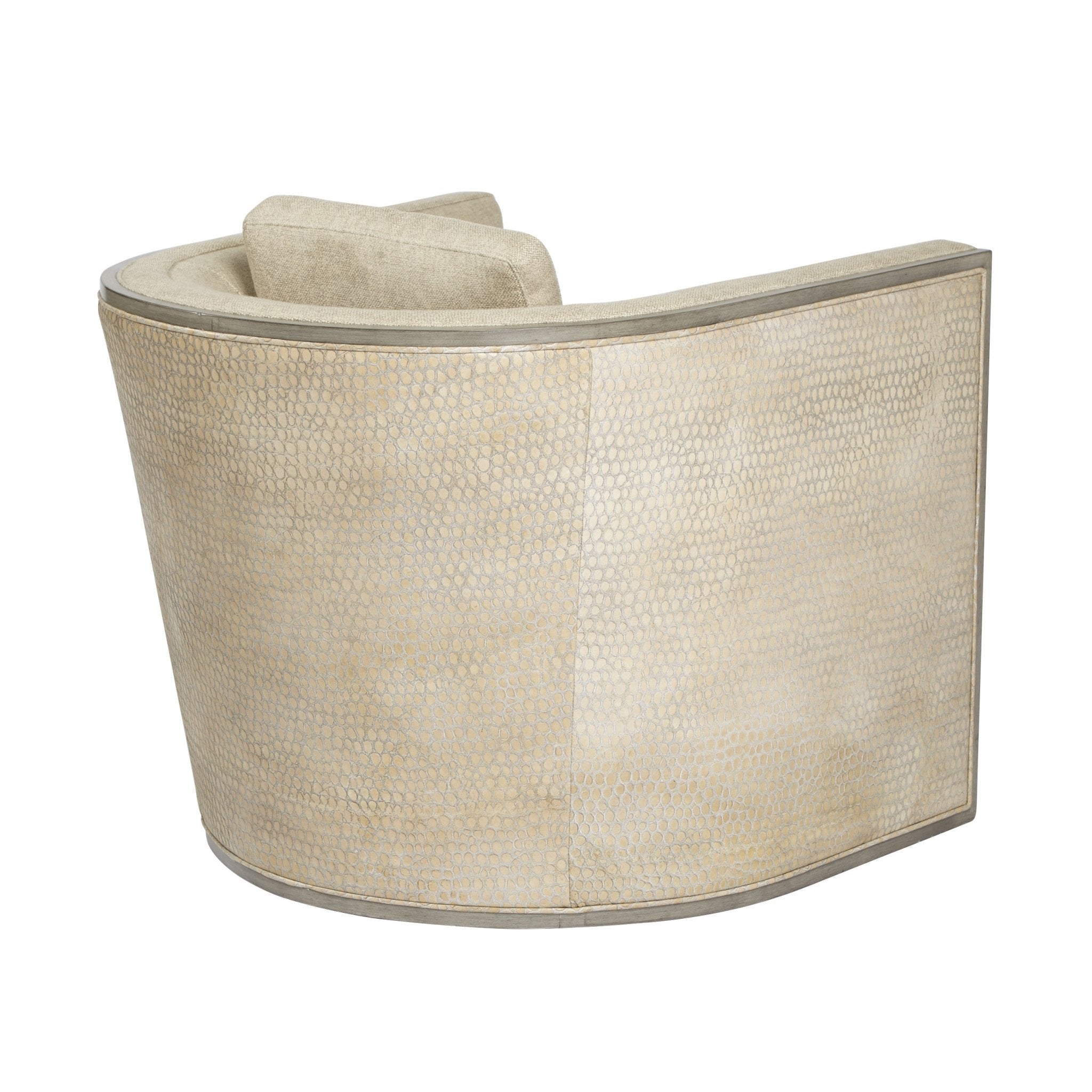 Curved-back modern tub chair side view, showing textured pattern.