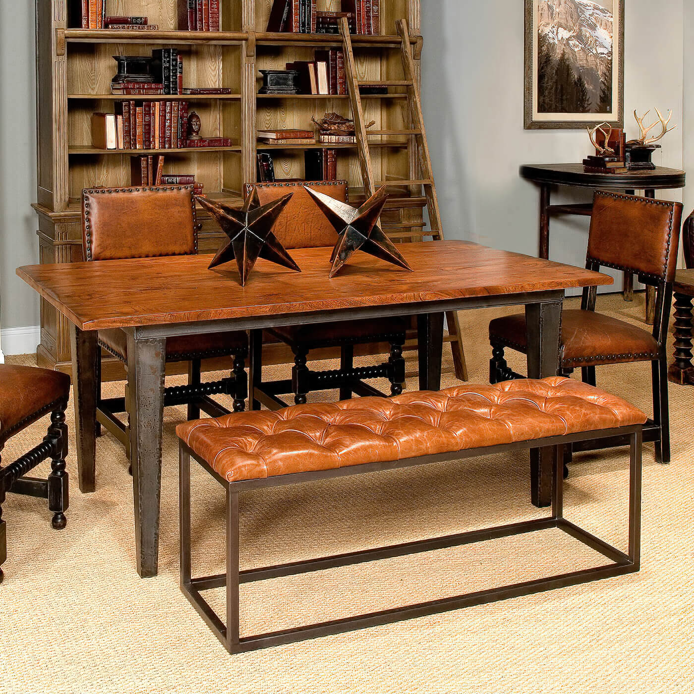 Leather bench at dining table with chairs.