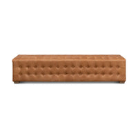 Front view of modern tufted leather bench.