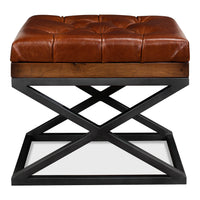 Front view of modern tufted leather X frame stool.