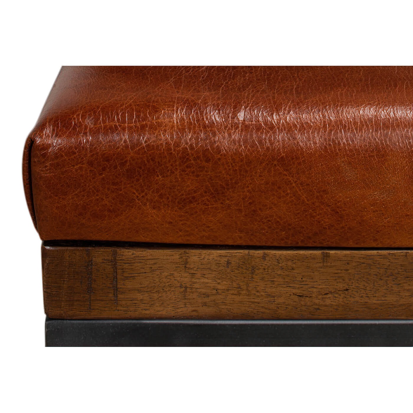 Close-up of leather and wood details on stool.