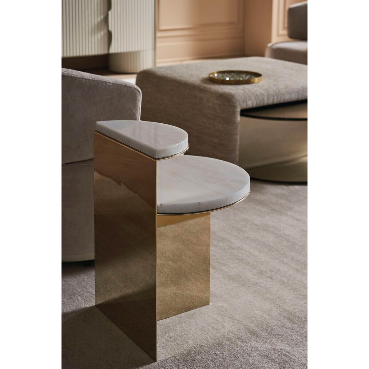 Two-tier end table in living room, next to sofa.