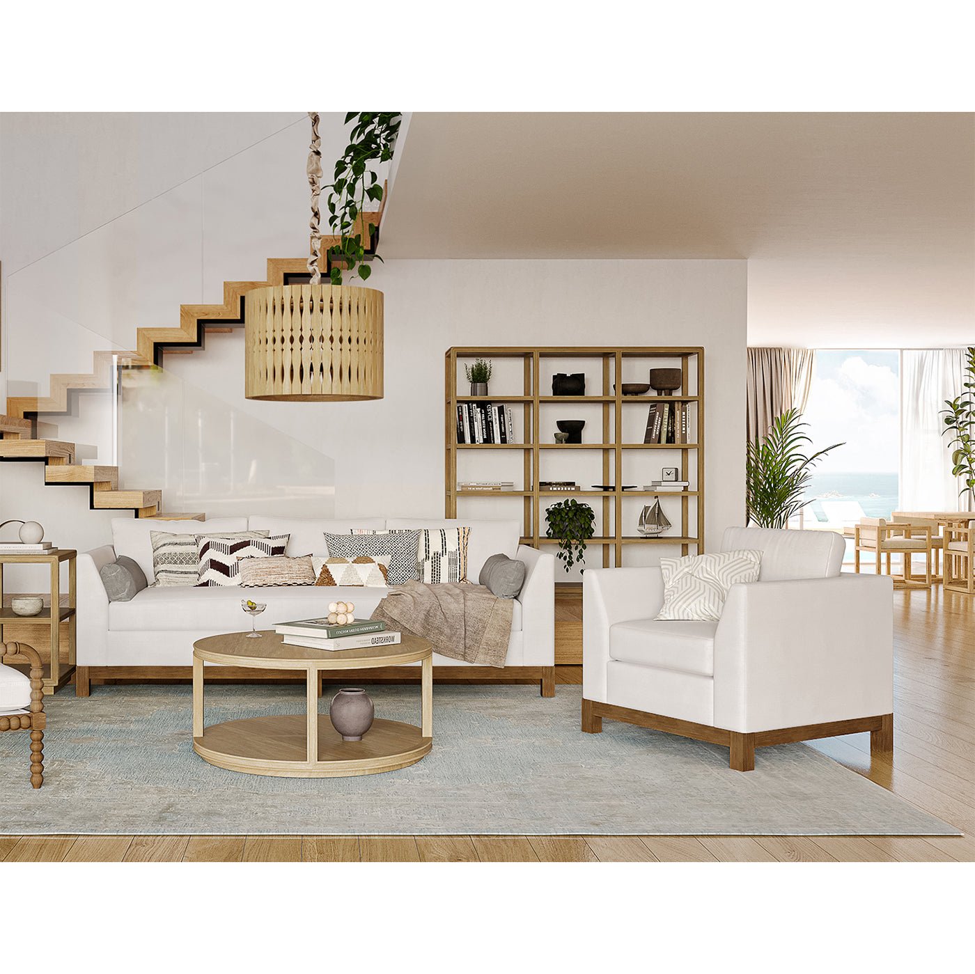 Modern armchair in white, staged in living room setting.