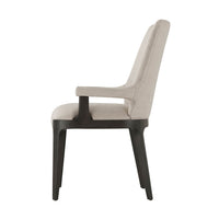 Side profile of modern upholstered dining armchair, elegant armrest.