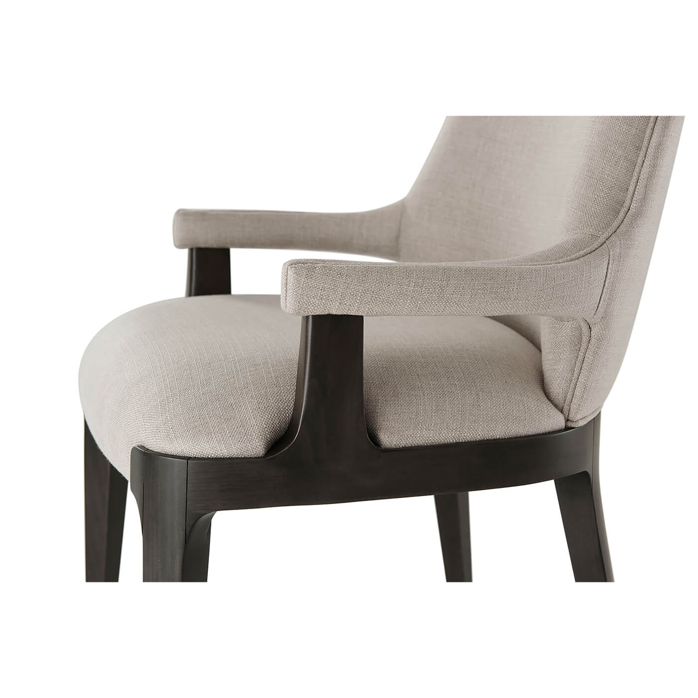 Armrest and seat detail of modern upholstered dining armchair.