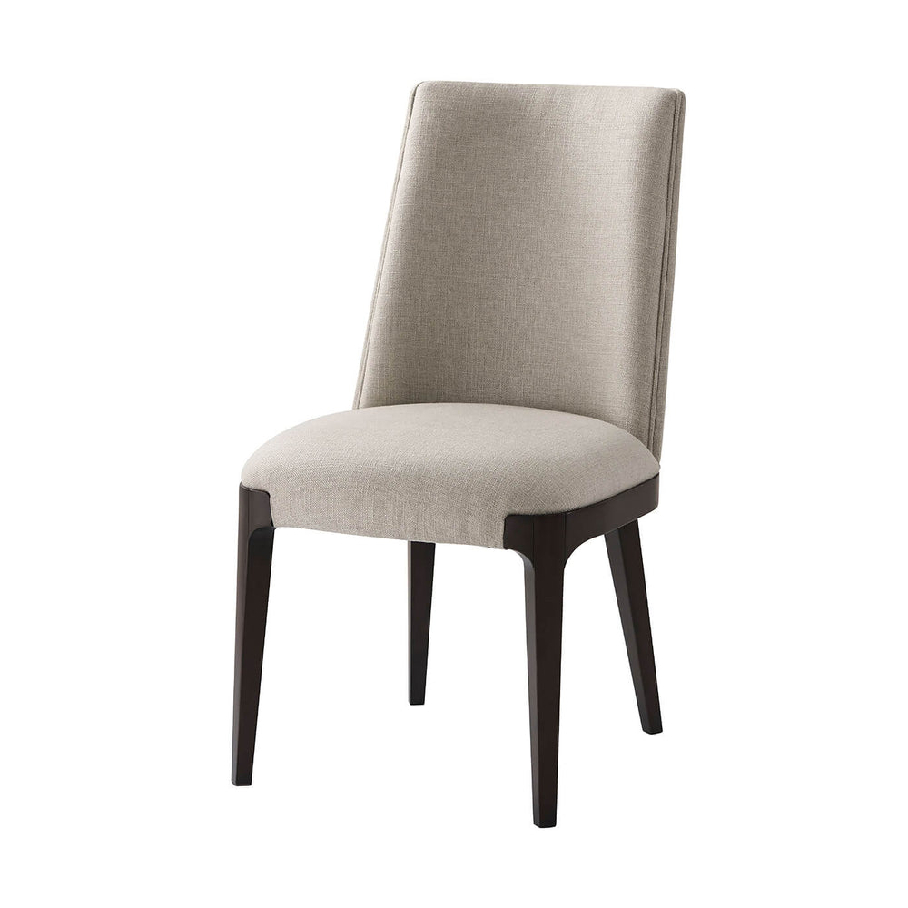 Front view of modern upholstered dining side chair.