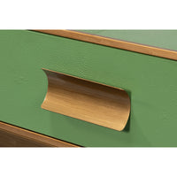 Close-up of console table drawer handle with gold finish.