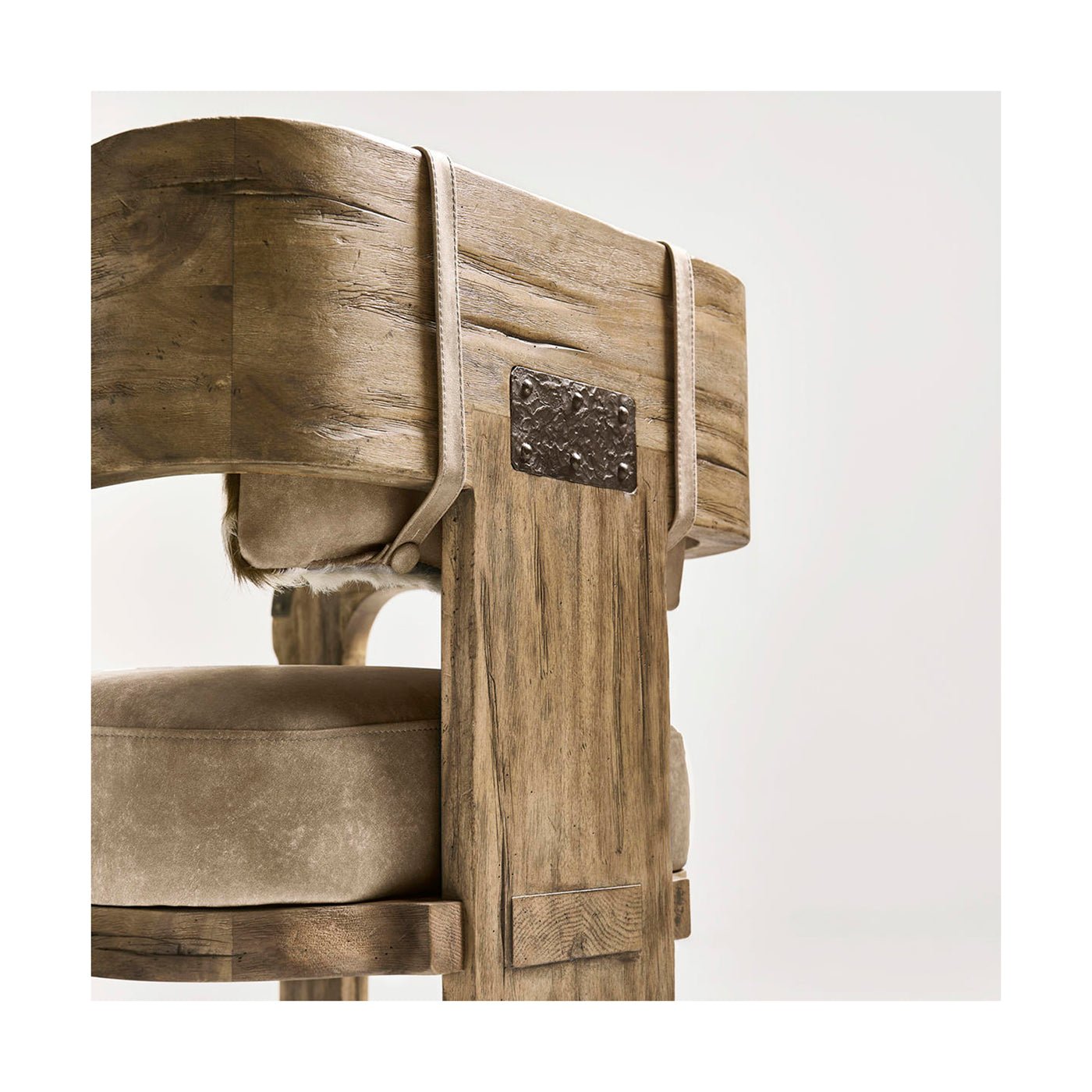 Chair side detailing with metal accent, modern design.