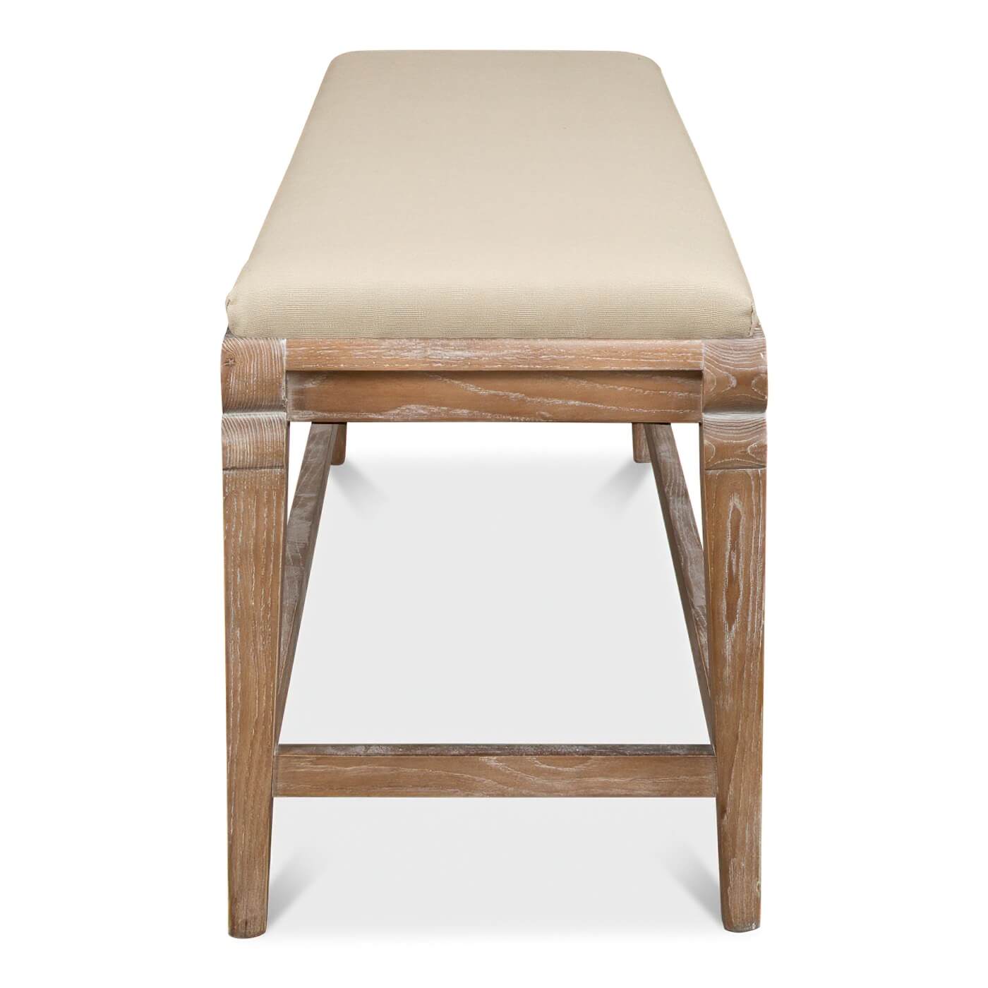 End view of bench showing wooden legs and cushion.