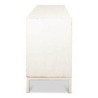 Left side of geometric whitewash sideboard.