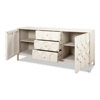 Open doors and drawers of geometric white sideboard.