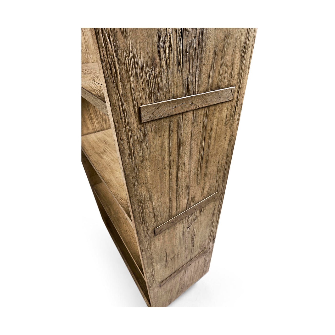 Detailed view of side panel with wood grain on bookcase.