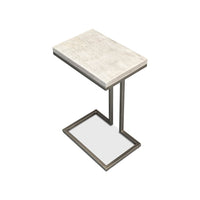 Modernist accent table, angled top view, light surface.