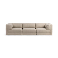 Front view of beige three-piece modular sofa showing three broad seats and a low profile
