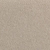 Detail of beige modular sofa upholstery showing its small, closely spaced loops