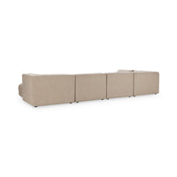 Rear view of beige modular sectional showing the upholstered backs of its connected pieces