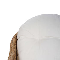 Close-up of chair's cushioned backrest detail.