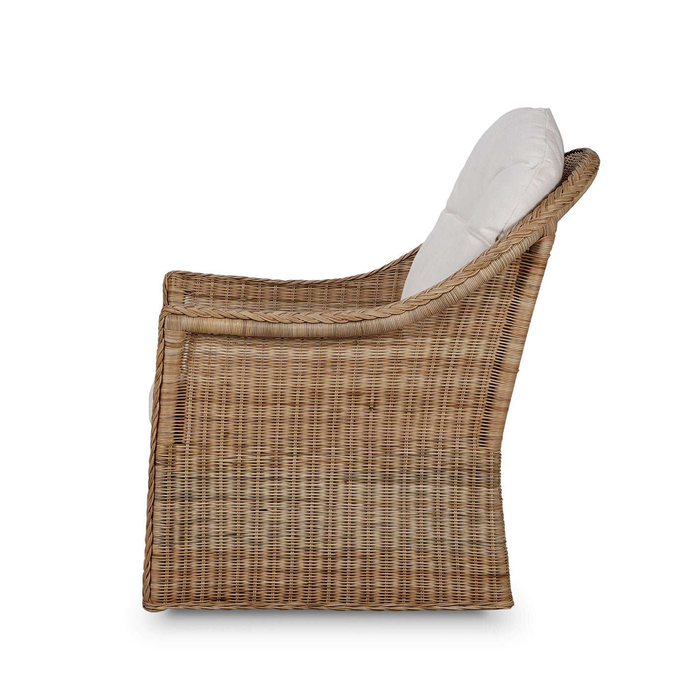 Side profile of rattan swivel chair with cushions.