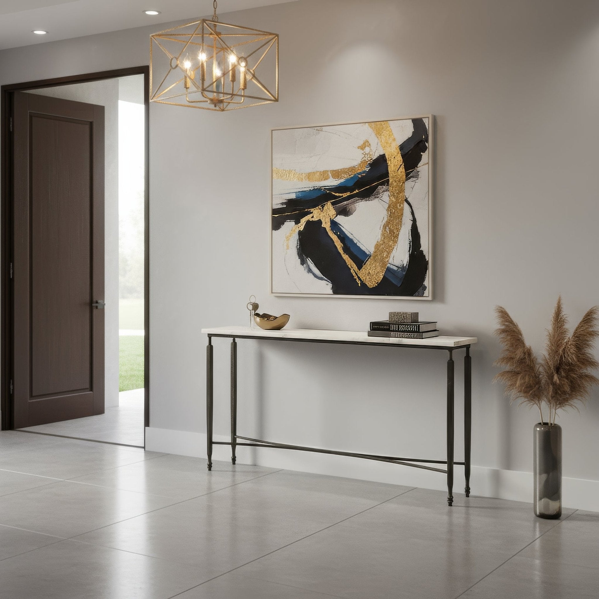 Console table in modern entryway with decor accents.