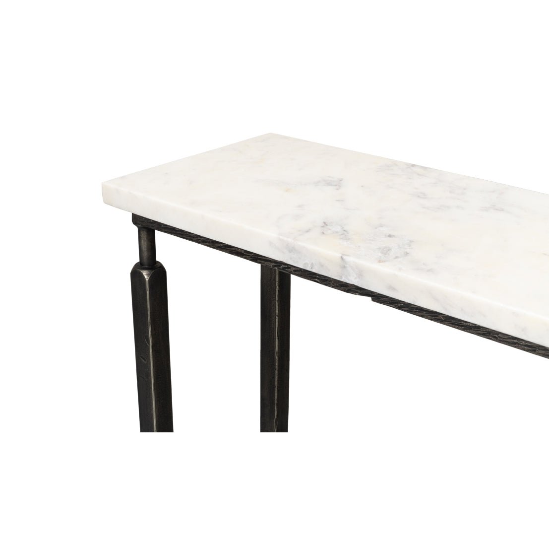 Corner detail of marble top on console table.