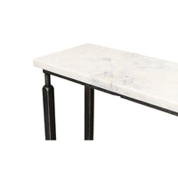 Corner detail of marble top on console table.