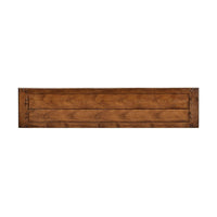 Top view of narrow walnut sideboard surface.