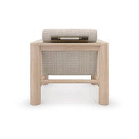 Rear view of natural oak arm chair with headrest.