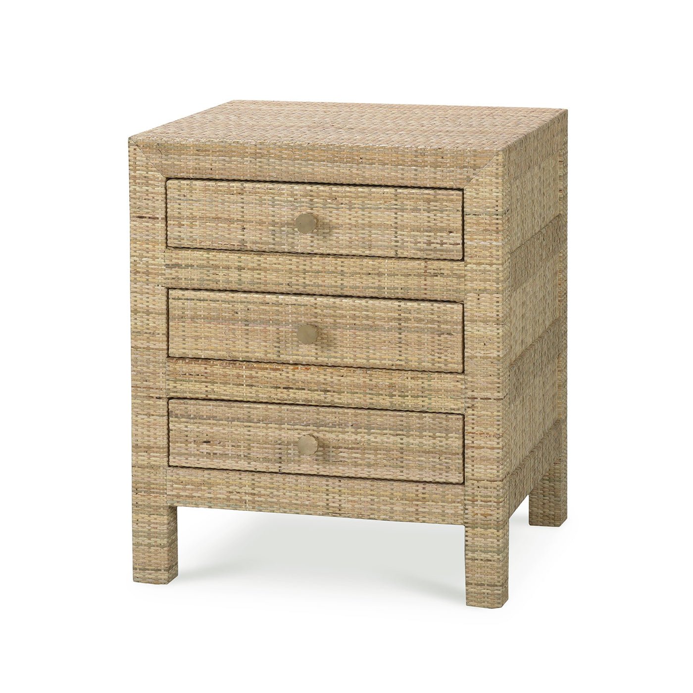 Rattan bedside table with three drawers, angled view.
