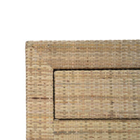 Close-up detail of rattan bedside table corner.