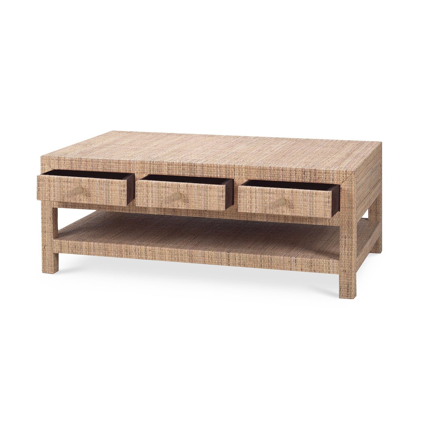 Angled view of natural rattan coffee table, open drawers.