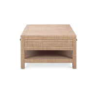 Side view of natural rattan coffee table, showing structure.