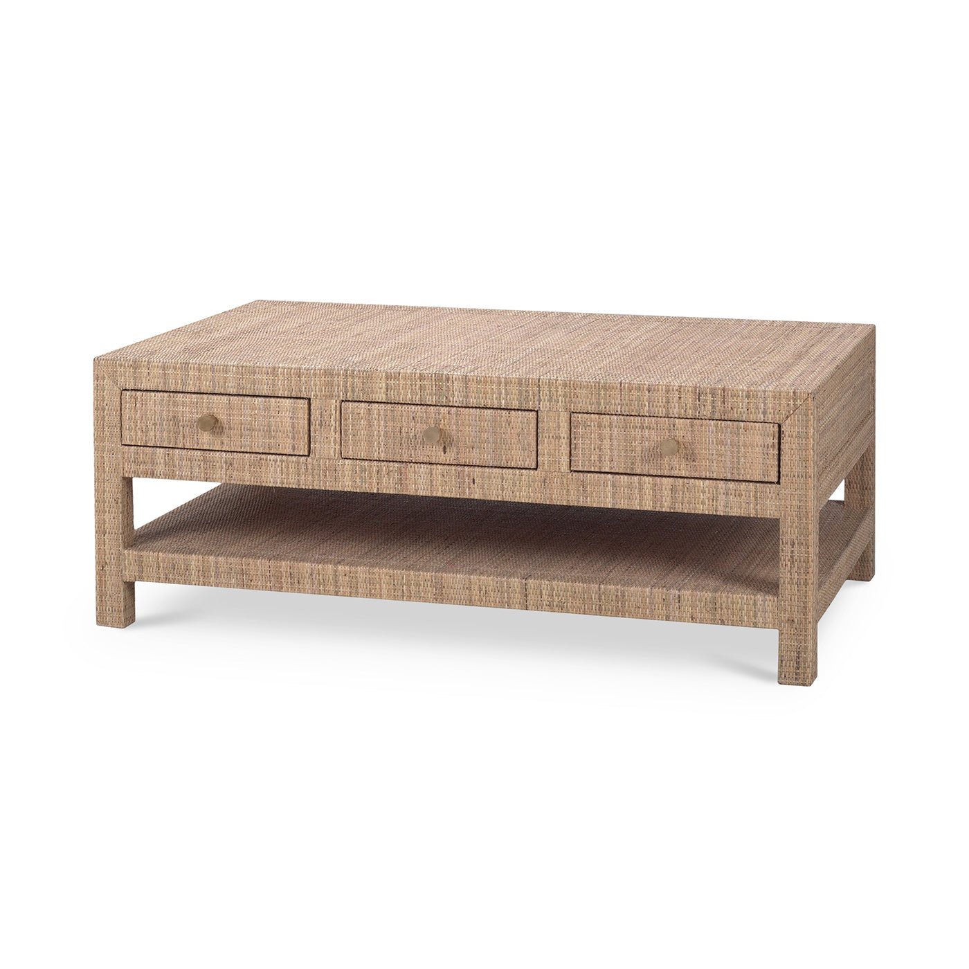 Angled view of natural rattan coffee table with drawers.