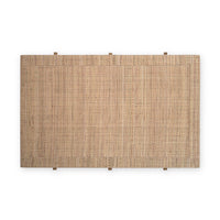 Top-down view of natural rattan coffee table's surface.