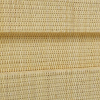 Detailed rattan weave on king bed frame.
