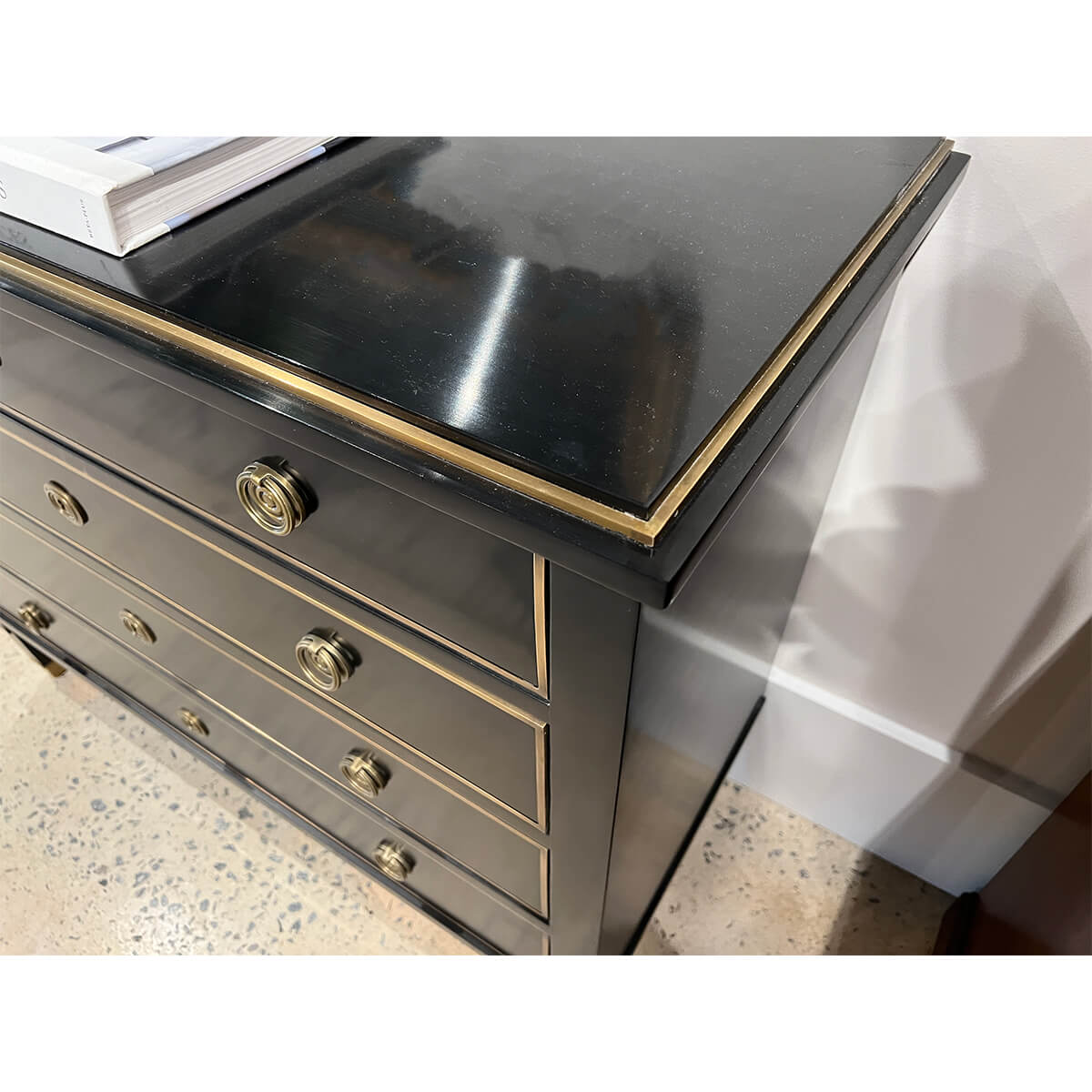Close-up of Neo Classic Black Chest's gold detailing
